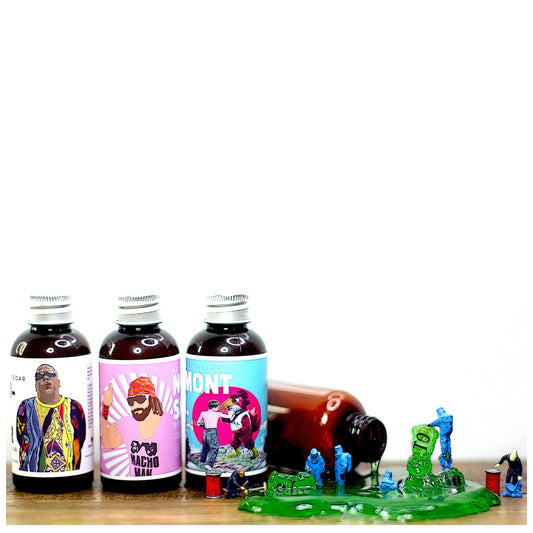 A shot of 3 Mens Beard Elixirs with Ho Scale Miniature scene by Archaic Revival