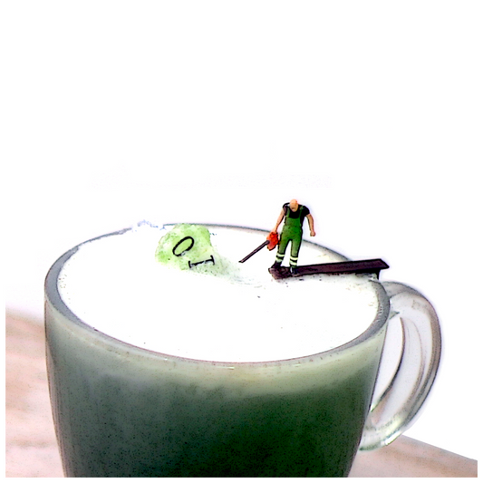 Overhead of Syrup being used in a Green Matcha Latte. 